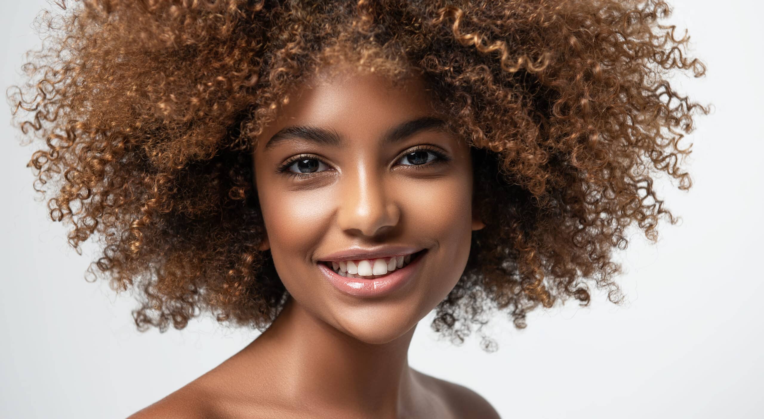 A beautiful African American woman smiling